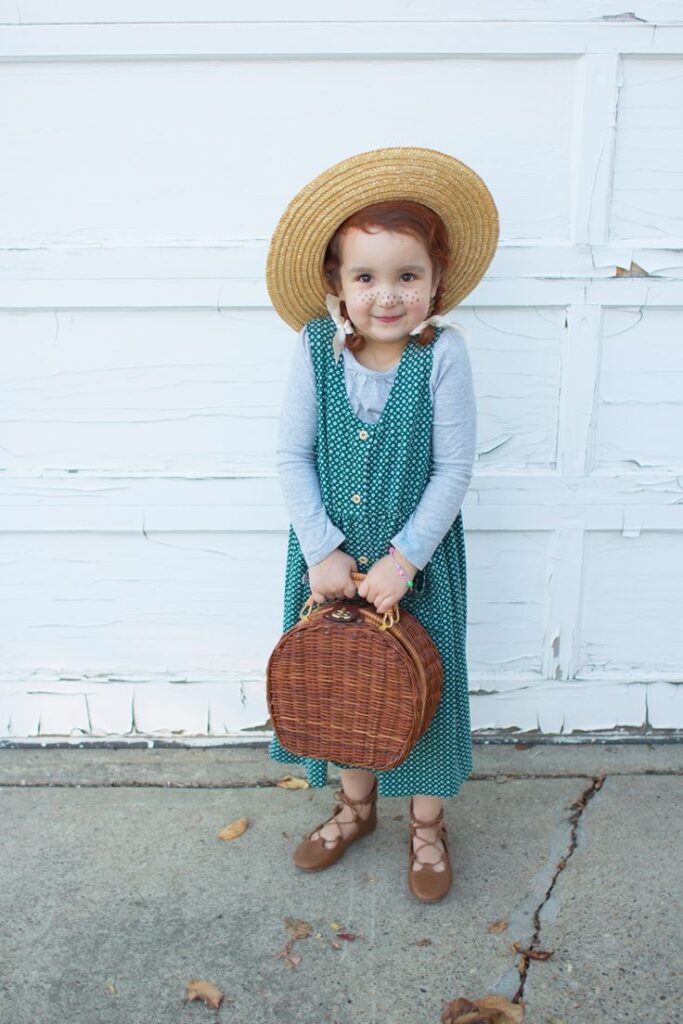 Child dressed as Anne of Green Gables from the book