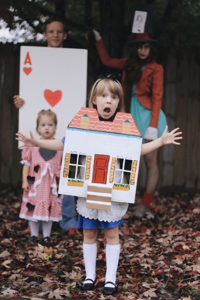 Child dressed as Alice In Wonderland from the book