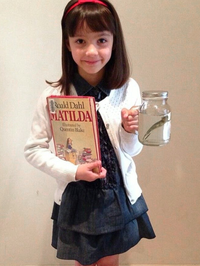 Child dressed as Matilda from the book