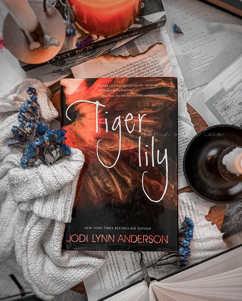 Tiger Lily by Jodi Lynn Anderson book cover paired with Taylor Swift cardigan song analysis